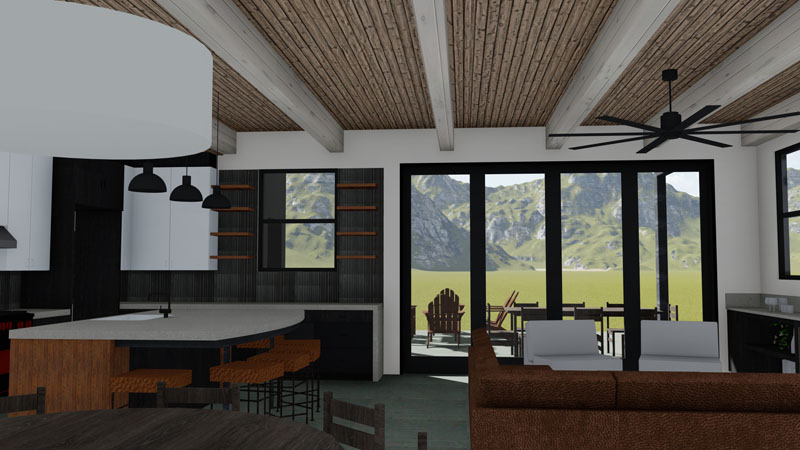 A modern kitchen and living area with a rustic wood ceiling and exposed beams feels like it's straight off the boards. There is a central island with bar stools, a ceiling fan, and large glass doors opening to a patio with outdoor seating. The patio overlooks a scenic view of mountains and greenery.