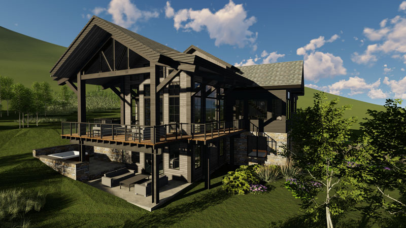 A modern, two-story house with large windows and a spacious wooden deck located on a hillside showcases exquisite architecture. The house features a mix of stone and dark-painted wood exterior, surrounded by lush green grass, trees, and plants. The sky is clear with a few clouds.